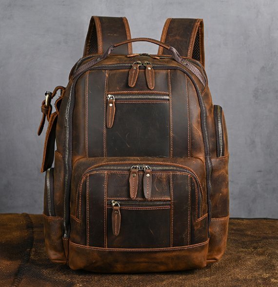 男の人の真皮の双肩包頭牛革の潮流復古の大容量バックパックビジネスレジャー拍卖