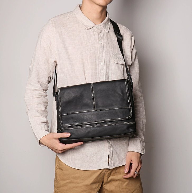 新作の男の人の手の郵便配達の包み牛革の単一の肩の包み女の人の肩の包み斜めに掛けます大容量のipadの包み真皮の男の包み拍卖