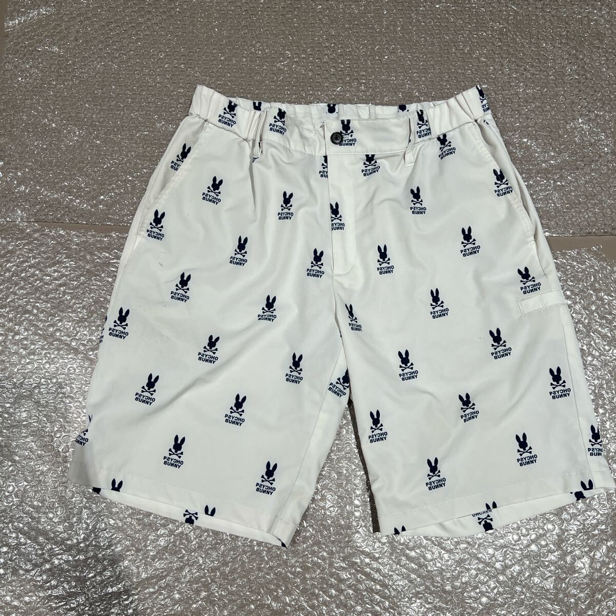 Psycho Bunny サイコバニー ハーフパンツ ホワイト 白 ゴルフ XLサイズ メンズ ウエストゴム ウェア golf 短パン 総柄ロゴ 男性用拍卖