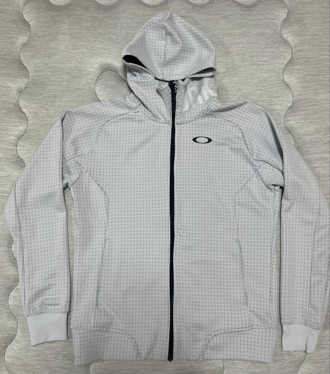 美品 OAKLEY オークリー パーカー フーディー アウター ジャケット ジップアップ 薄グレー S拍卖