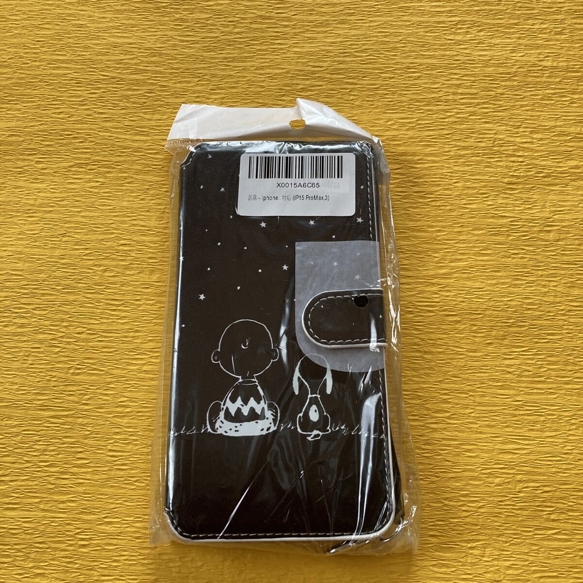n6184 iPhone 15 Pro スヌーピー・ウッドストック 後ろ姿 ブラック 手帳型スマホケース 未使用拍卖