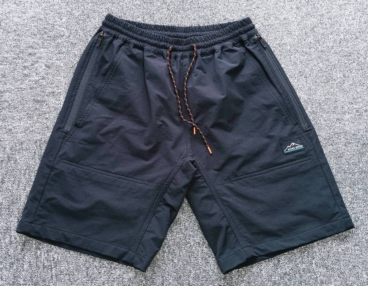 新古品!ティゴラ×ビームスデザイン 撥水ストレッチ ベンチレーション 8ポケット アウトドアハーフパンツ(黒S=74)拍卖