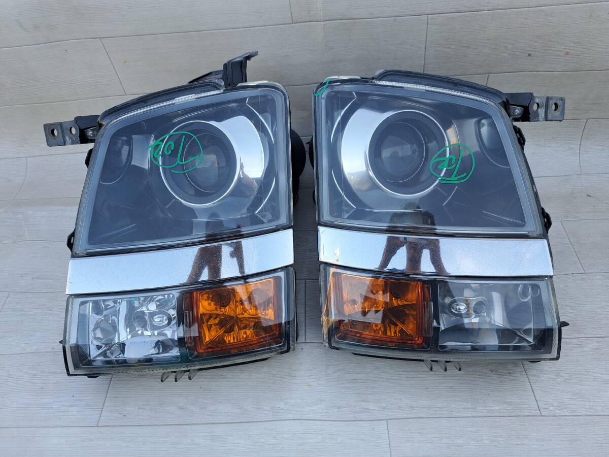 702 ワゴンR RR MH21S MH22S AZワゴン MJ21S MJ22S ヘッドライト メッキ ヘッドランプ 左右 電動レベライザー付HID 光軸100-59052拍卖
