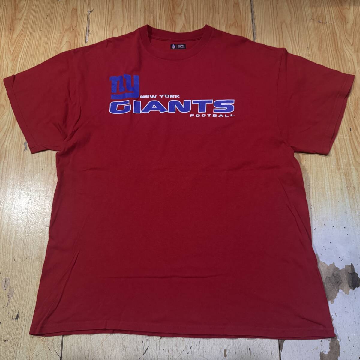 即決・クリックポスト発送・輸入古着・NFL・ニューヨークジャイアンツのTシャツ・赤・XL拍卖