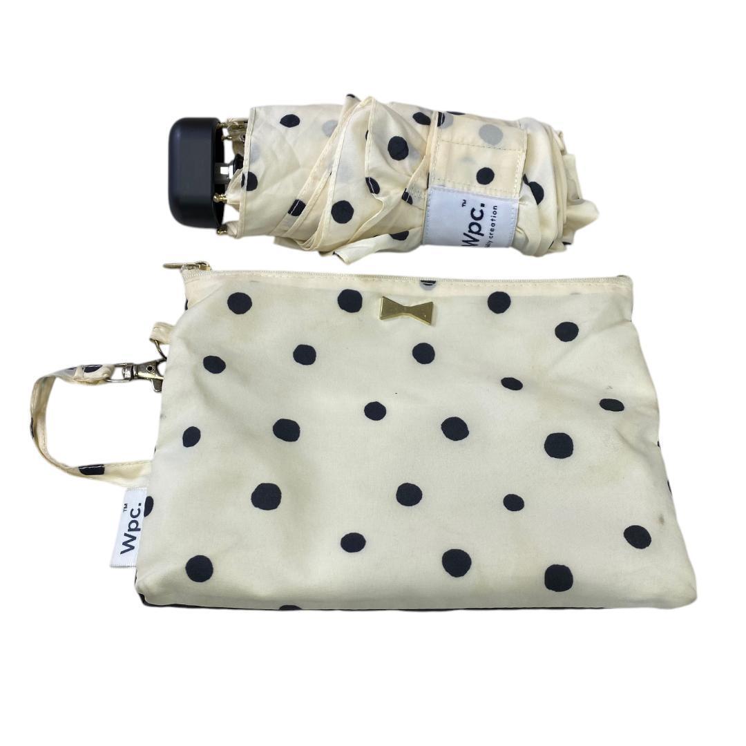 yw37 wpc. ドット柄 レディース 折り畳み傘 リボンモチーフ収納袋付き拍卖