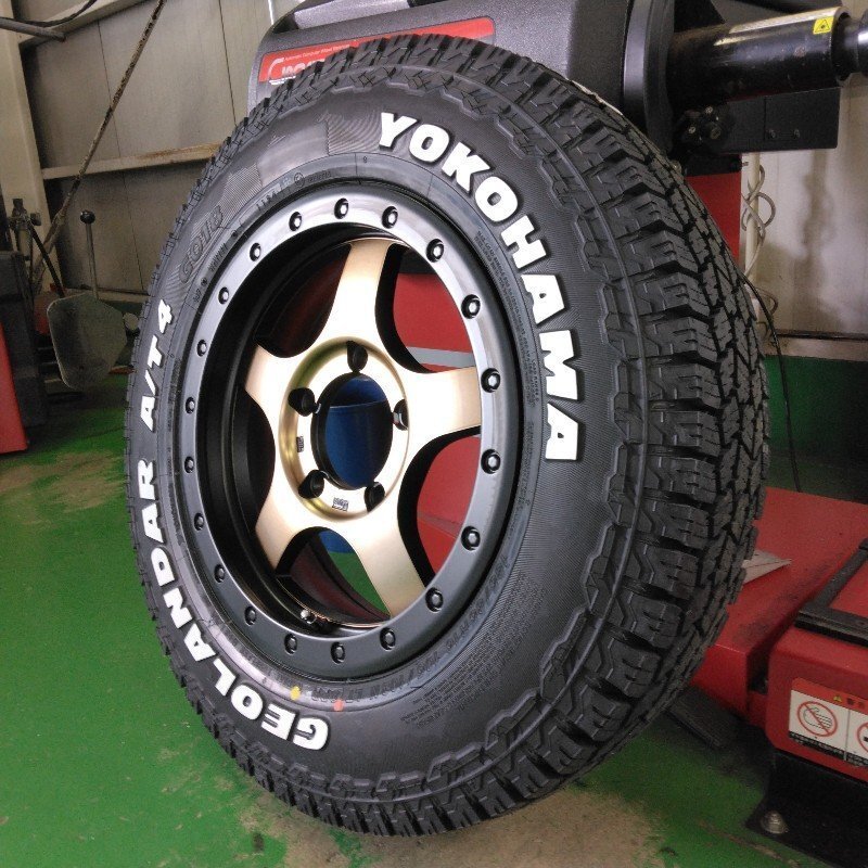 新品/4本セット ジムニー タイヤホイール 185/85R16 ヨコハマタイヤ ジオランダー AT4 ホワイトレター 16インチ BDX05拍卖