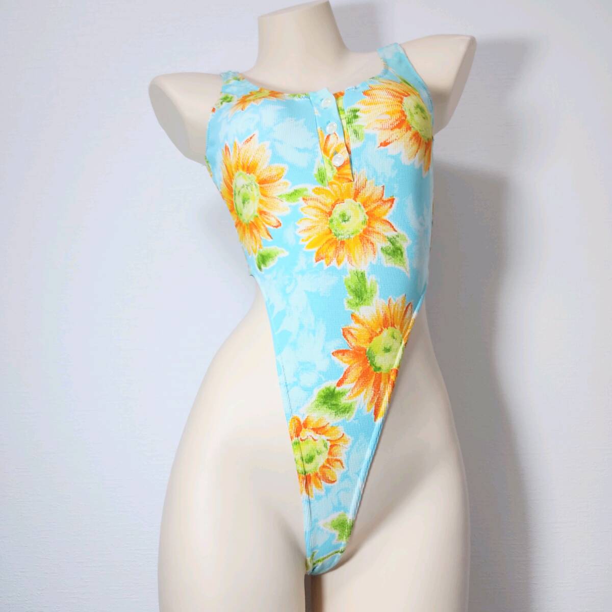 83*cecileレオタード(9M)★超ハイレグTバック光沢パステルライトブルー水色イエロー黄色ひまわり柄★伸縮性あり男性も拍卖