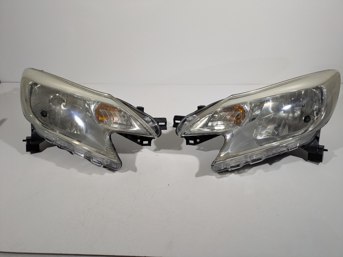 日産純正 E12 HE12 NE12 SNE12 ノート ハロゲン ヘッドライト 左右セット ICHIKOH 1868 棚番L-1501/L-1502拍卖