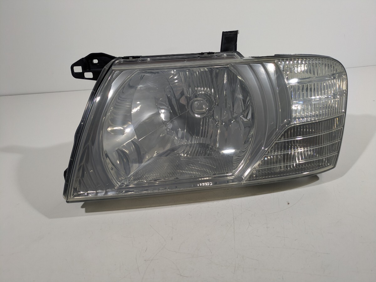 三菱純正 V73W/V75W/V78W パジェロ ハロゲン ヘッドライト 左側 KOITO 100-87419 棚番L-1528拍卖