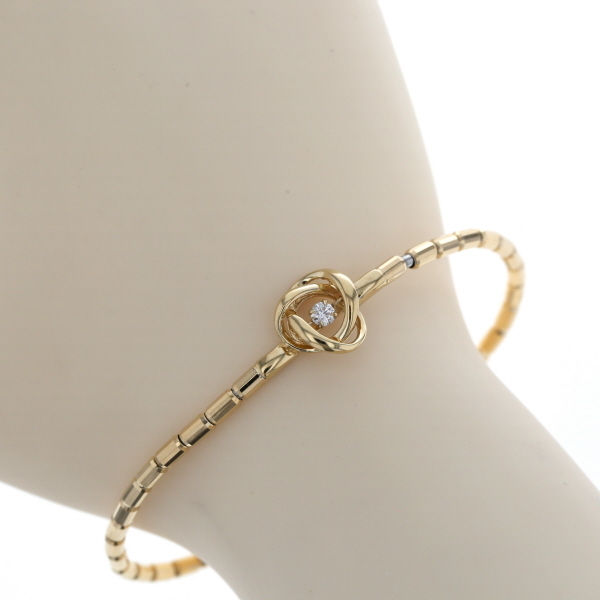 K18YG ブレスレット ダイヤモンド 0.10ct ダンシングダイヤ ノット ストレッチバングル 16.5cm~F【新品仕上済】【zz】【中古】拍卖