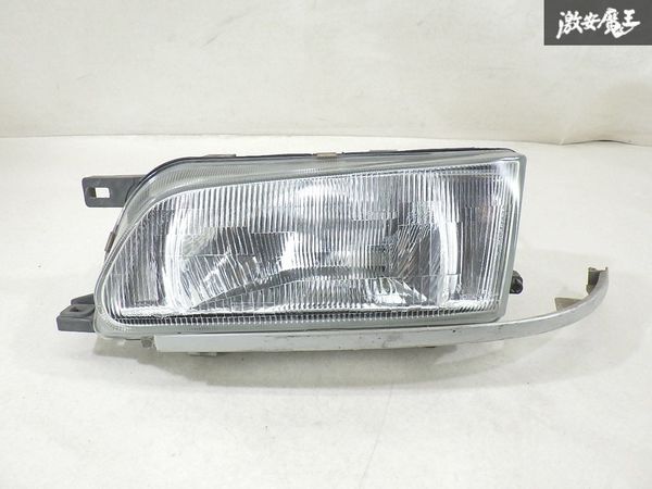 【レンズ割れ無し!!】 日産 純正 Y10 ウイングロード ハロゲン ヘッドライト ヘッドランプ 片側のみ ICHIKOH 1544 棚18-5拍卖