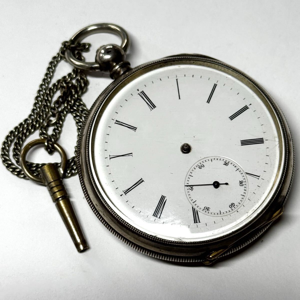 コロン商会 商館時計 銀無垢 SV800 鍵巻式 可動品 時針・分針が欠品してます スモセコ 獅子印 懐中時計 アンティーク 提げ時計 機械式拍卖