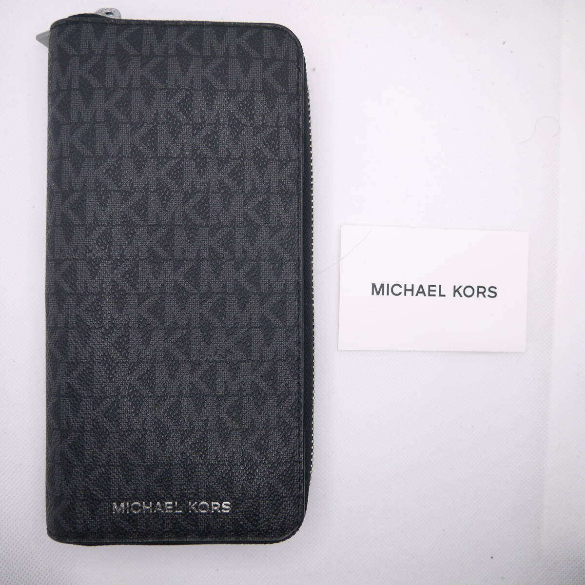 $ 新品 $ 希少♪◆ MICHAEL KORS ◆ マイケルコース ◆ MK モノグラム PVC レザー製 ◆ ラウンドファスナー 長財布 定期入れ◆ 黒 ブラック拍卖