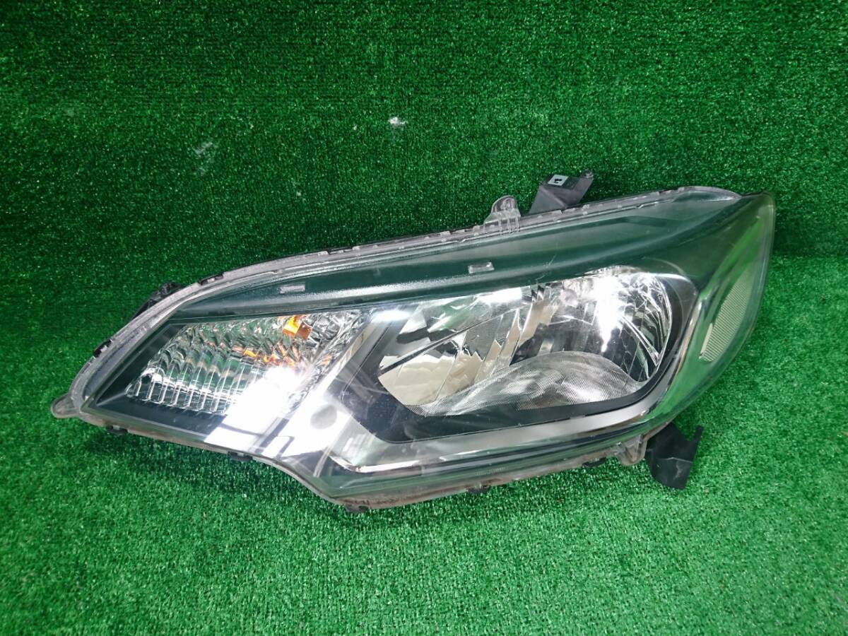 GK3 フィット 左ヘッドライト スタンレー W0349(47473)拍卖