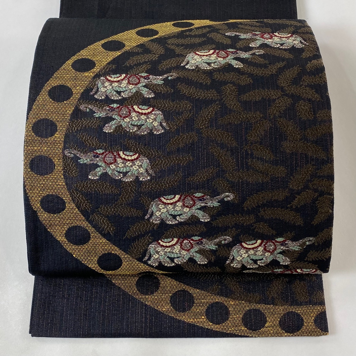 袋帯 美品 逸品 落款 織人七人衆 葉柄 象 箔 墨色 お太鼓柄 正絹 【中古】拍卖