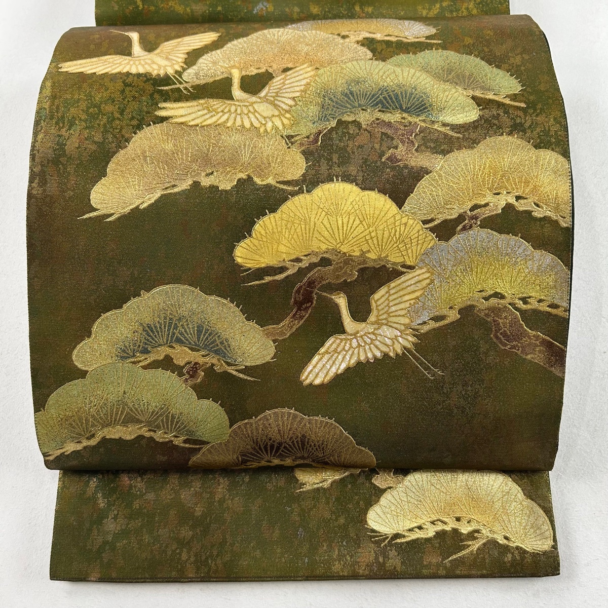 袋帯 美品 名品 落款 鶴 松 螺鈿 箔 茶緑色 お太鼓柄 正絹 【中古】拍卖