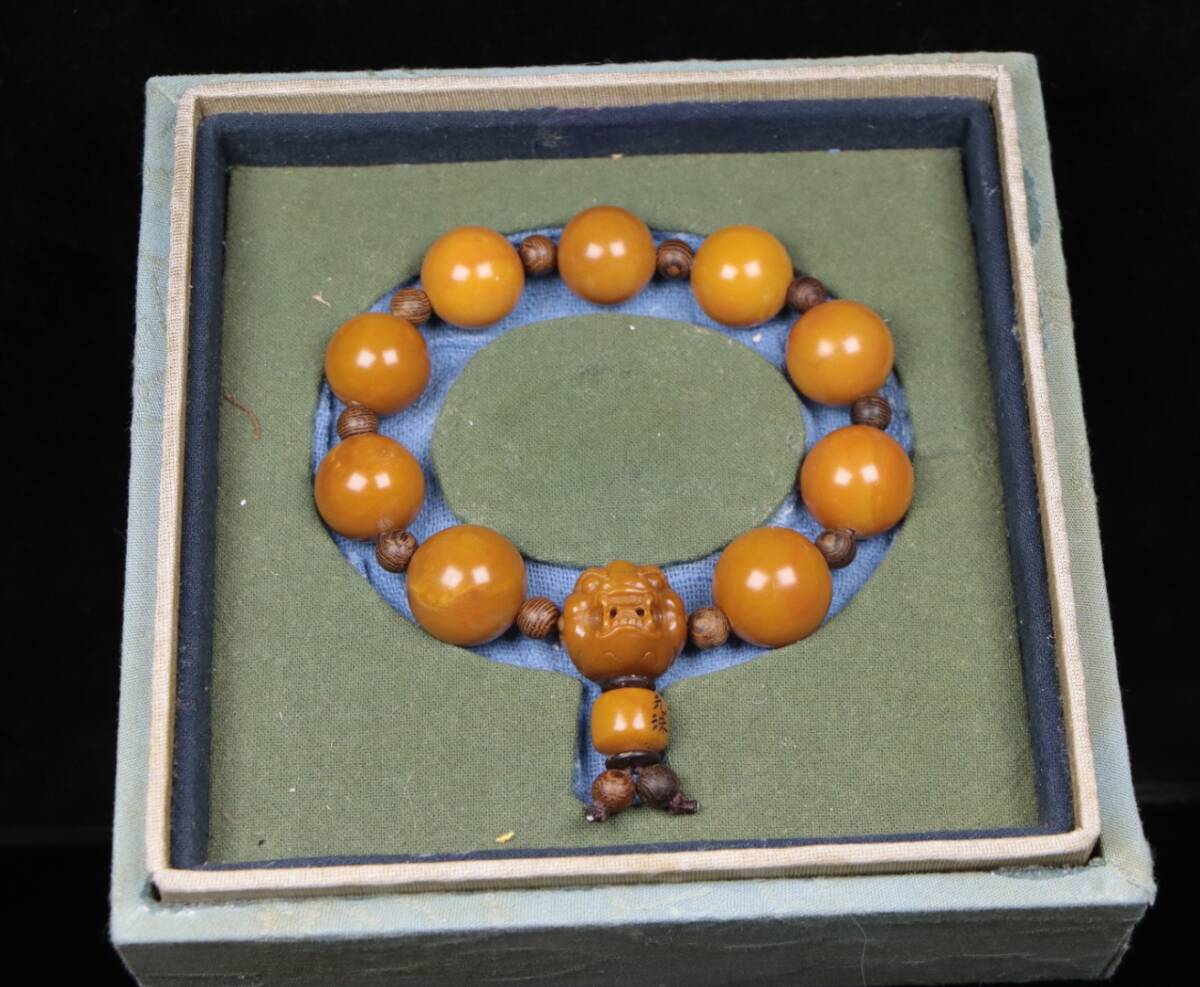 旧蔵 【清代篆刻家 林元珠】寿山石 滿黄圓珠 瑞獸守護手鏈 手釧(其中一顆有裂) 天然石 極細工 中国古玩 骨董品 古美味 209拍卖