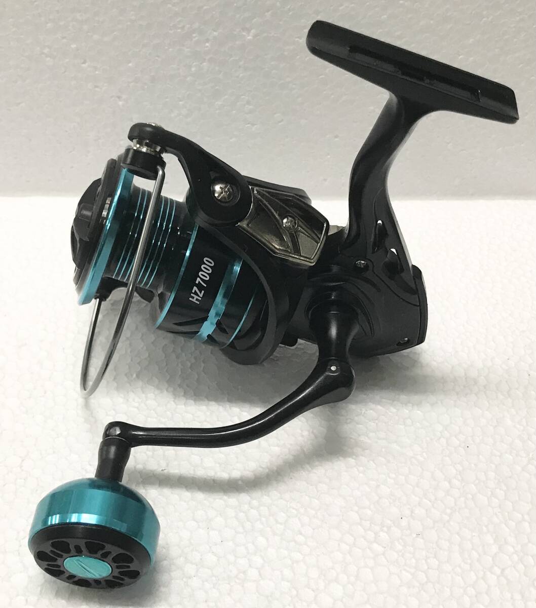 TAKUMI-Sスピニングリール7000☆送料無料☆新品未使用☆ブルーメタリックブラック左右ハンドル変更可能☆ロータリーグリップ☆333グラム☆拍卖