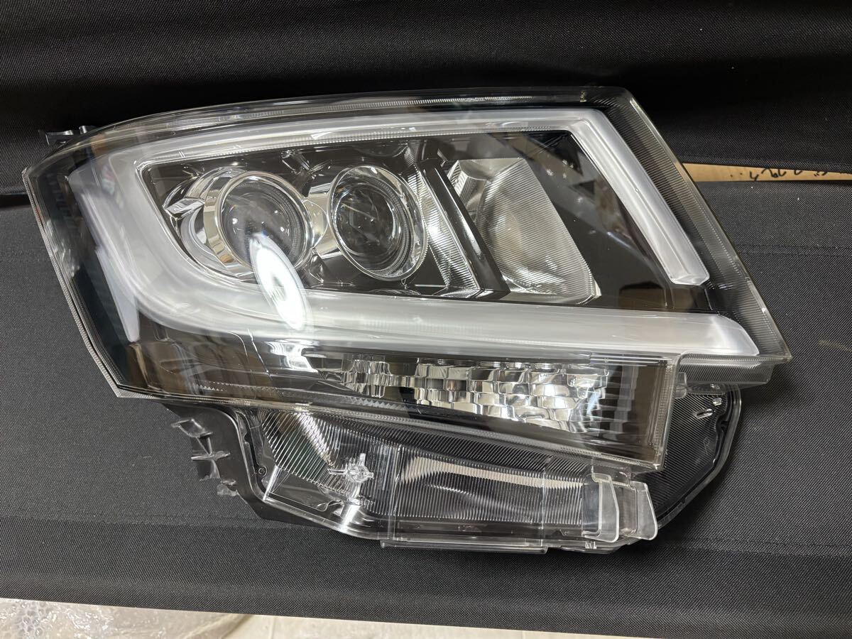 ムーヴ カスタム LA150S LA160S 右ヘッドライト LED KOITO 100-69010 拍卖