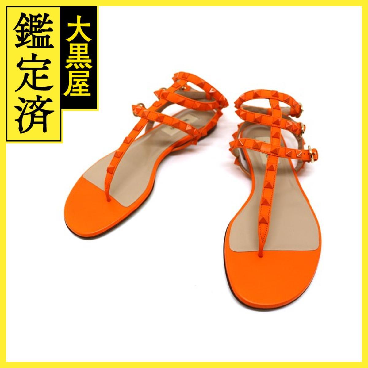 VALENTINO バレンチノ 靴 ロックスタッズ フラットサンダル レディース37ハーフ(約24cm) オレンジ レザー GWS0812拍卖
