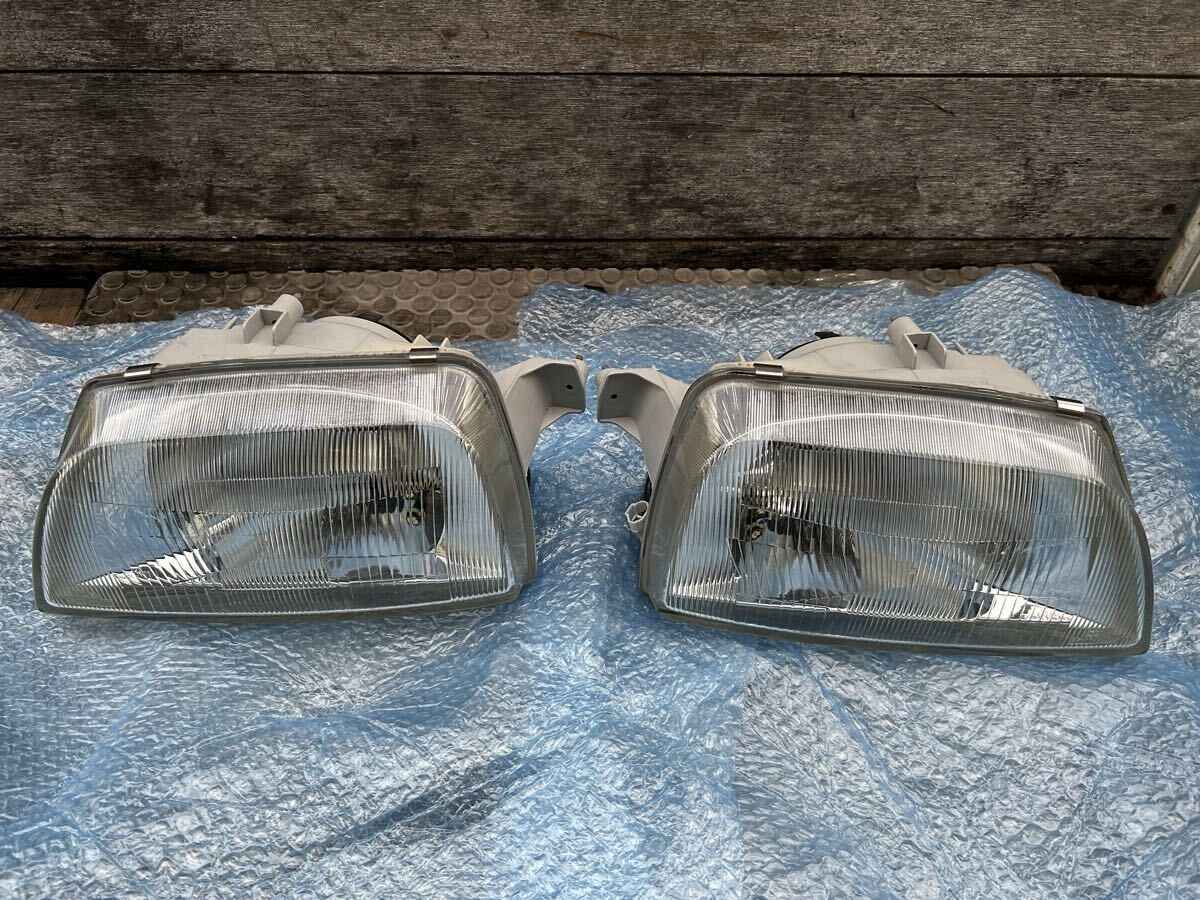 美品 SUZUKI スズキ アルト ヘッドライト 左右 35100-70GOR拍卖