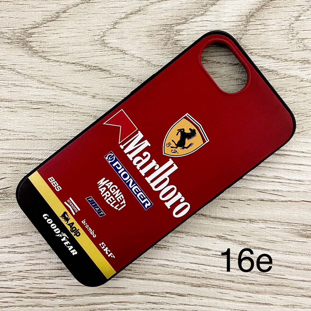 マールボロ フェラーリ iPhone 16e ケース F1 Ferrari マルボロ プロスト アレジ シューマッハ スマホ拍卖
