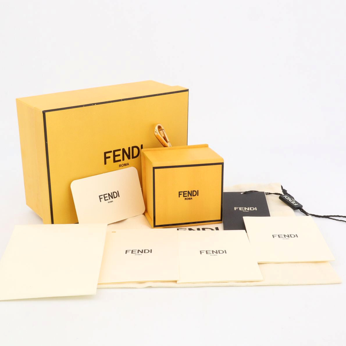 フェンディ FENDI ミニボックス チャーム キーホルダー ゴールド金具 メンズ レディース イエロー 7AR894拍卖