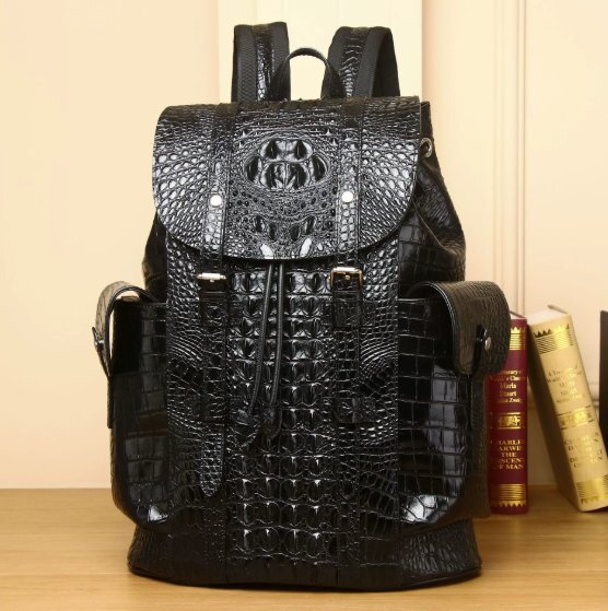 ワニの紋の男の人のリュックサック大容量のハイエンドのリュックサックアウトドアの百は流行の旅行バッグに乗ります拍卖