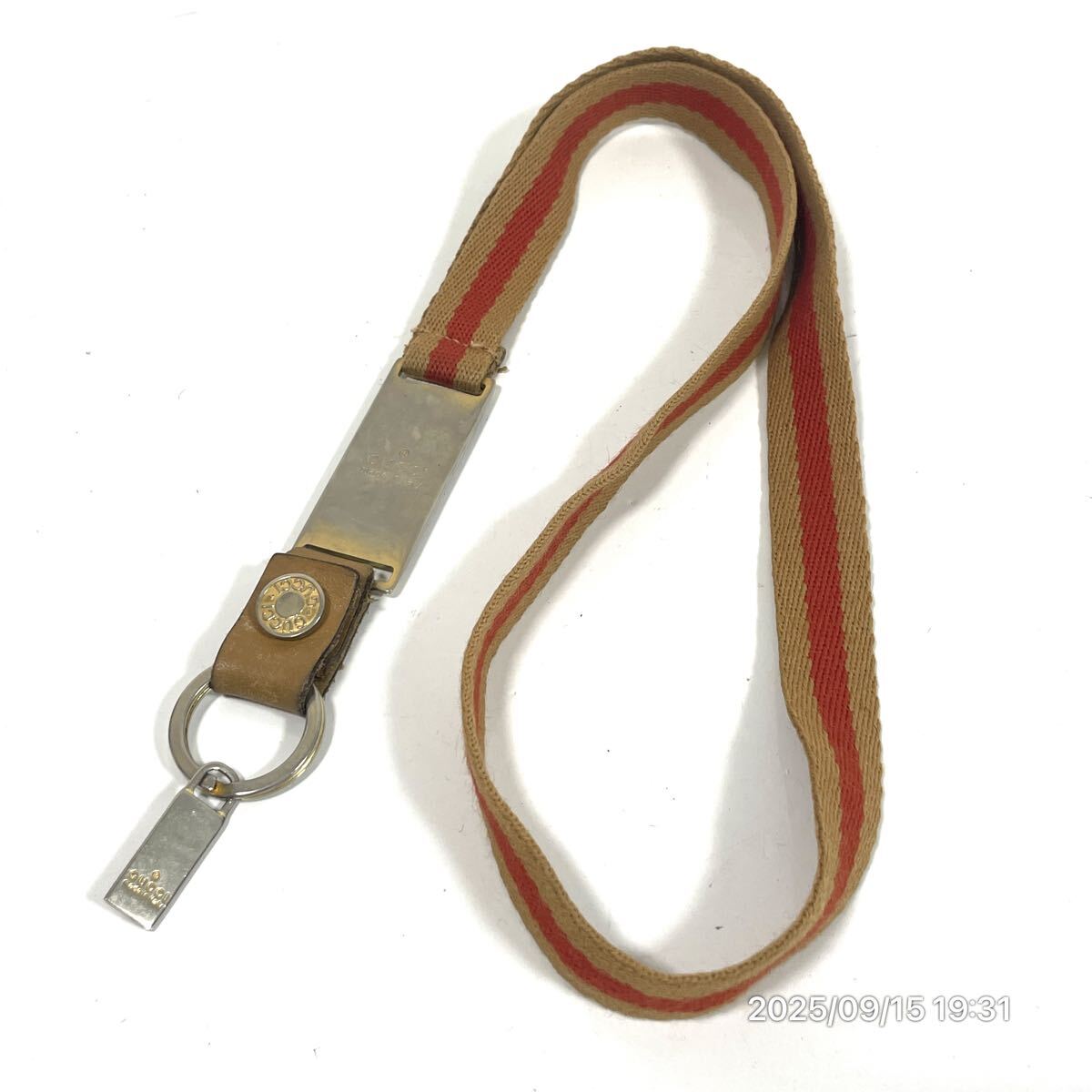 GUCCI グッチ ウェブライン ブランドロゴ ゴールド×オレンジ×ブラウン系カラー キャンバス レザー 革 ネックストラップ 携帯ストラップ拍卖