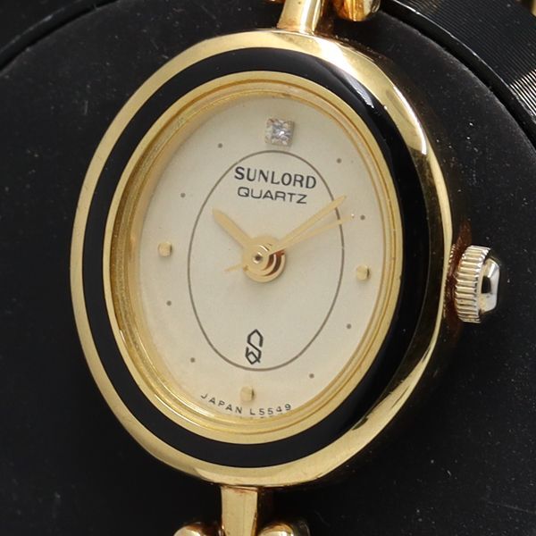 サンロード L5549 石付 オーバル QZ アイボリー文字盤 レディース腕時計 TKD 2000000 NSK拍卖