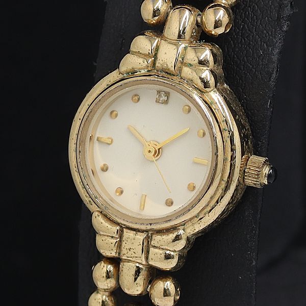 稼動 ポーラ QZ ラウンド 石付 アイボリー文字盤 レディース腕時計 2000000 NSK INU拍卖