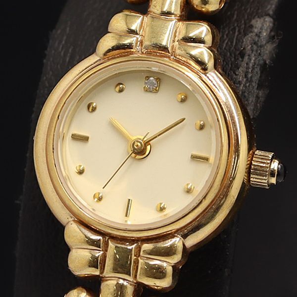 稼動 良品 ポラ QZ アイボリー文字盤 石付 ブレスレットウォッチ レディース腕時計 OGI 2000000拍卖