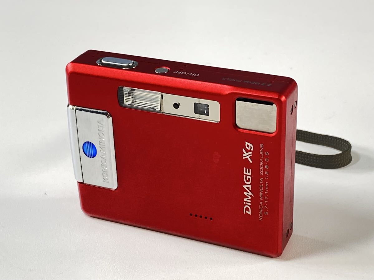 ★通電確認済み MINOLTA ミノルタ コニカミノルタ DiMAGE Xg コンパクトデジタルカメラ デジカメ コンデジ カメラ 赤 現状品 ●管理KA337拍卖