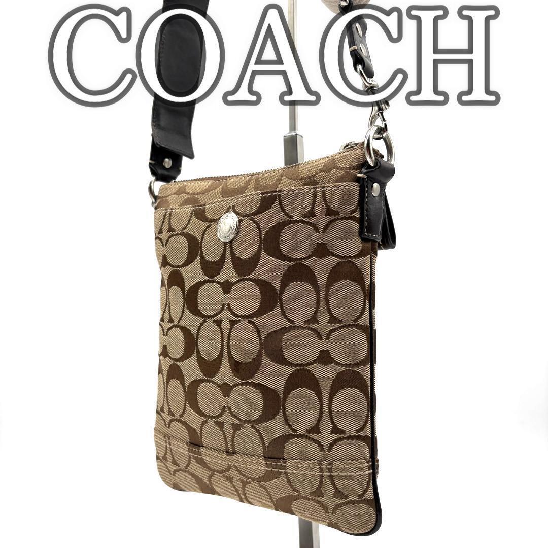 【良品】コーチ ショルダーバッグ サコッシュ キャンバス シグネチャー ブラウン拍卖