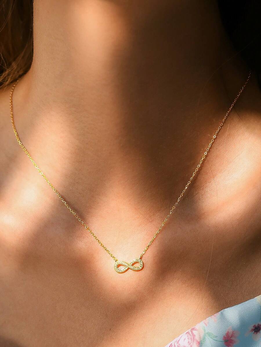 ジュエリー レディース ネックレス ペンダント 925スターリングシルバー ミニマリストモビウスループ インフィニティジルコニアペ拍卖