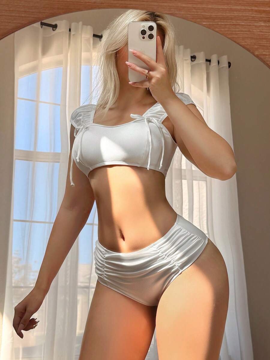 レディース 水着 ビキニセット リブ素材バックレス ストラップ トップ と ラッフル付きスイムショーツ キュートでカジュアルな水着拍卖