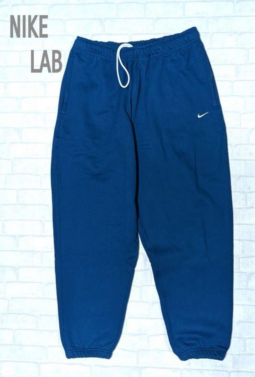 新品 正規品 ナイキ NIKE LAB XLサイズ メンズ裏起毛 ソロスウォッシュ パンツ ネイビー拍卖
