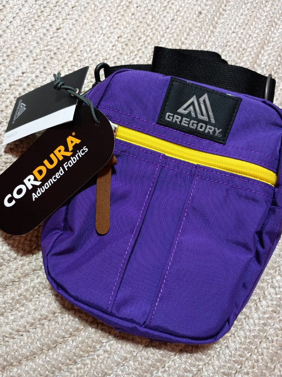 新品 未使用 GREGORY グレゴリー クイックポケット M パープル イエロー レイカーズカラー コーデュラナイロン ショルダーバッグ ポーチ 拍卖