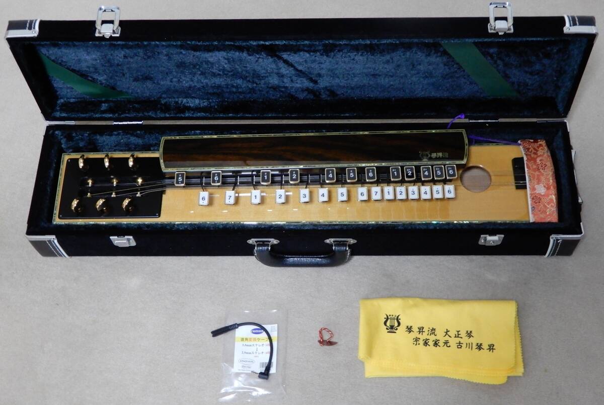 琴昇流 高級大正琴 コムニクス CK-150 ピックアップ付 6弦27鍵 点検済み美品 ハードケース、ピック、変換プラグ拍卖