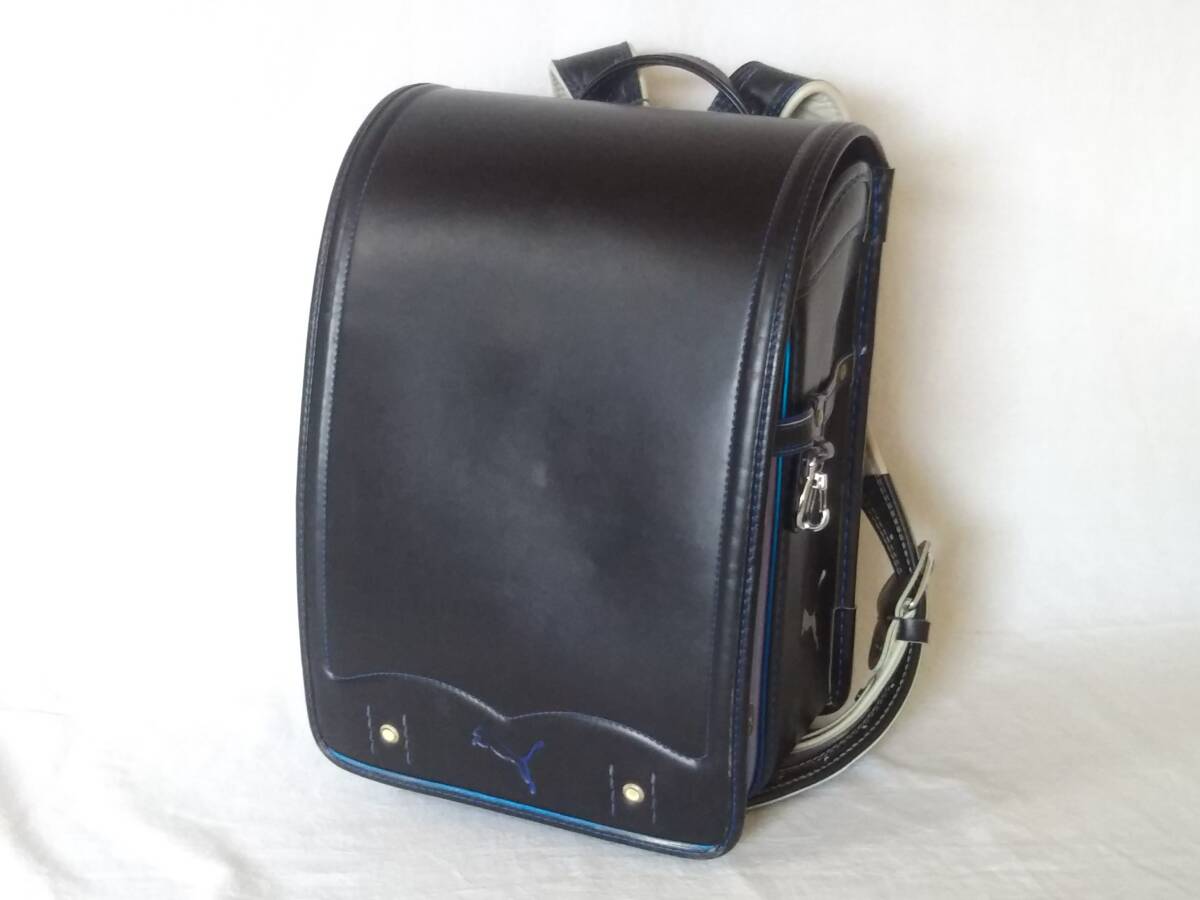 ★PUMA プーマ ランドセル 黒×青×紫 反射材 キャットロゴ ブラック ブルーライン パープル 現状渡し拍卖