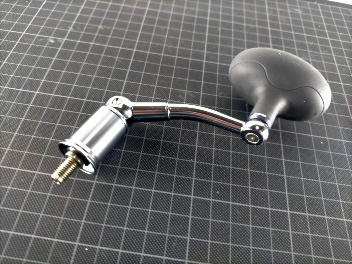 攝【廃盤パーツ】シマノ 09 ツインパワーSW 12000HG ハイギア 【純正 ハンドル 左】日本製 Shimano TWINPOWER 2904F拍卖