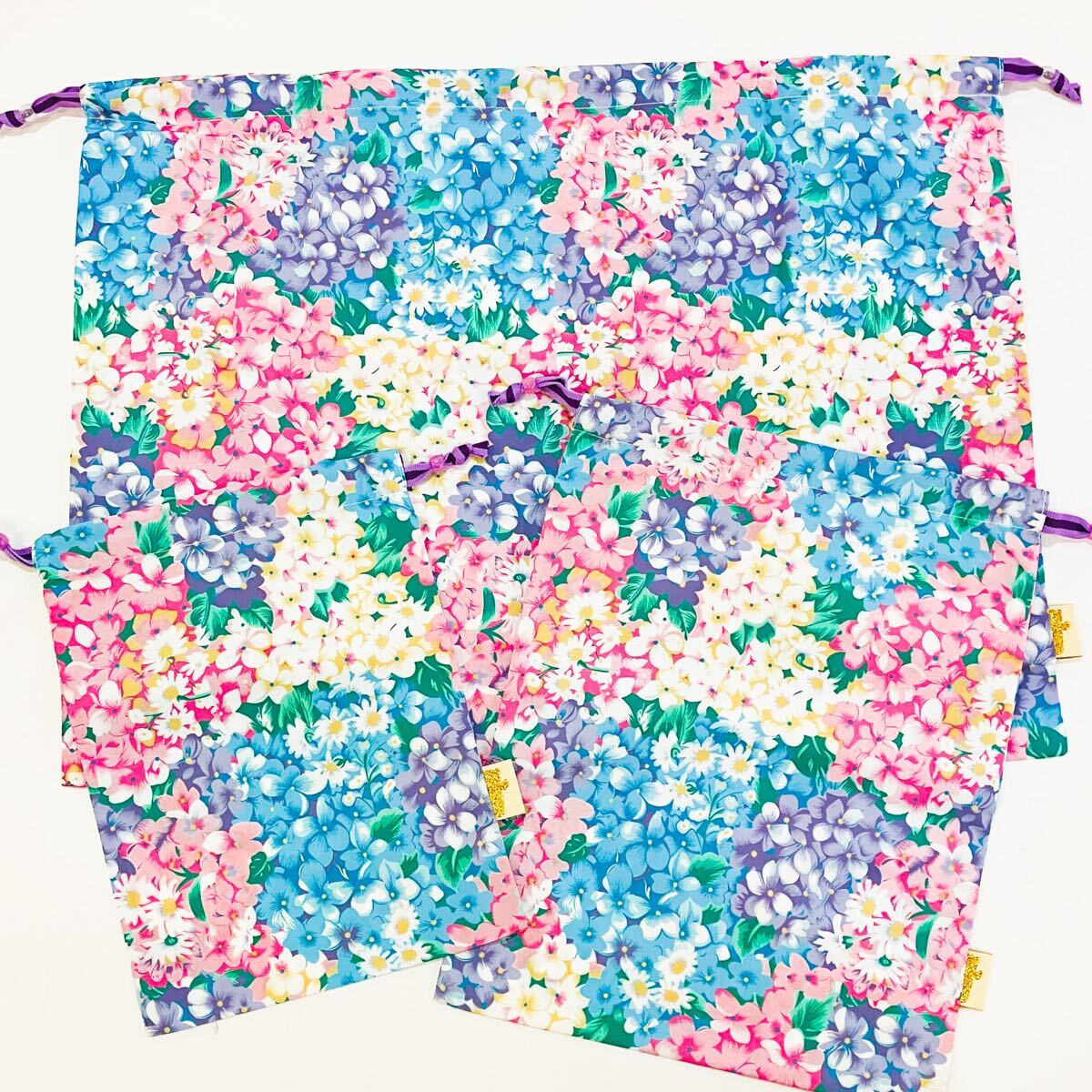 【新品未使用】fafa フェフェ 巾着袋 3枚セット マルチフラワー 花柄 カラフル 撥水加工 ポリエステル 旅行 小物収納 体操服 かわいい拍卖