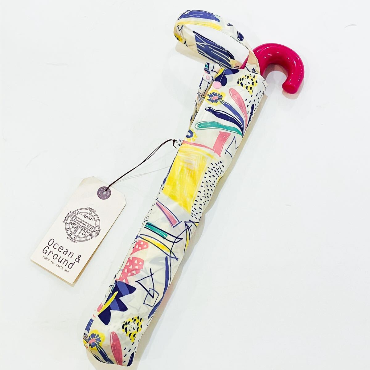 【新品未使用】Ocean & Ground オーシャンアンドグラウンド 傘 折りたたみ傘 折り畳み傘 雨傘 カラフル 花 落書き柄 55cm アイボリー拍卖