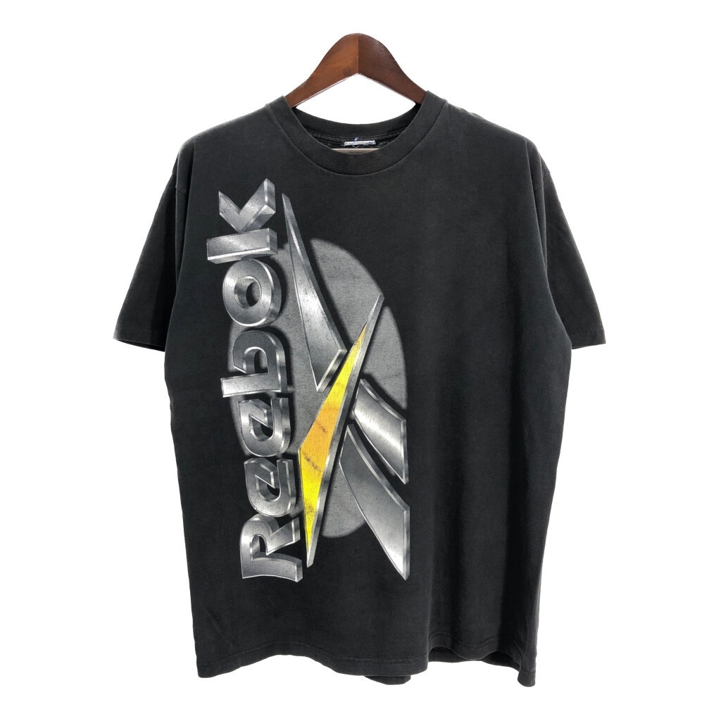 90年代 Reebok リーボック メタリックロゴ 半袖Tシャツ スポーツ ブラック(メンズ XL相当)中古 古着 U0594拍卖