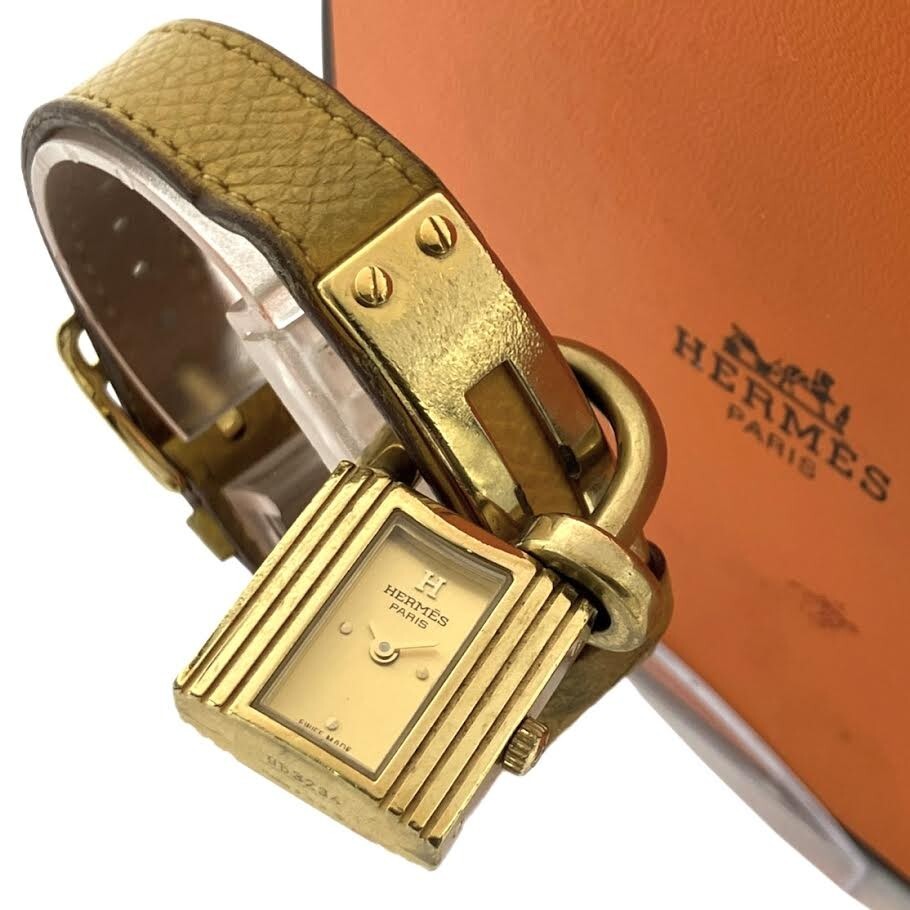 仙75&35【電池交換済/訳有】HERMES ケリーウォッチ 腕時計 クォーツ 箱付 エルメス QZ ゴールド文字盤 革ベルト 〇Z刻印 イエロー拍卖