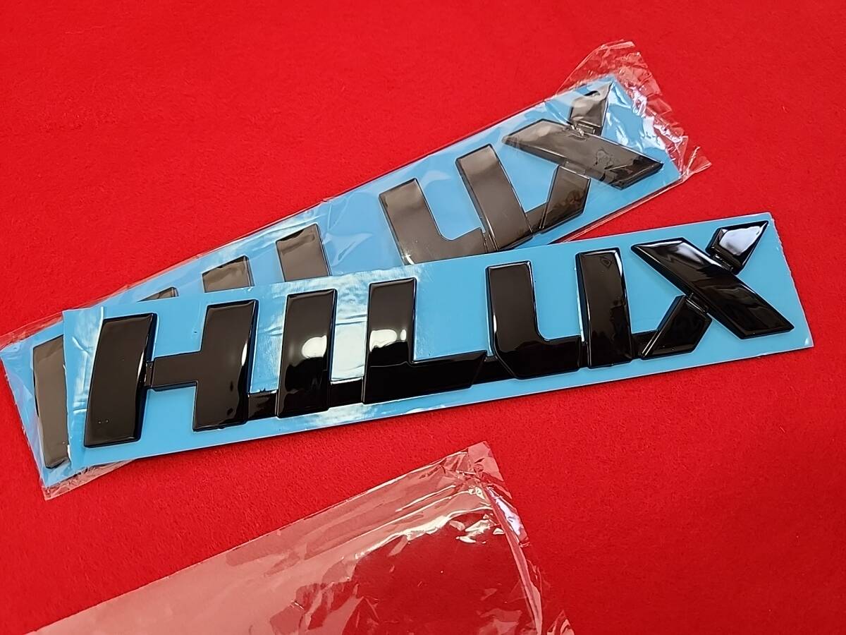 国内発送 トヨタ ハイラックス GUN125用 ピアノブラック HILUX ロゴエンブレム 2枚 社外品拍卖