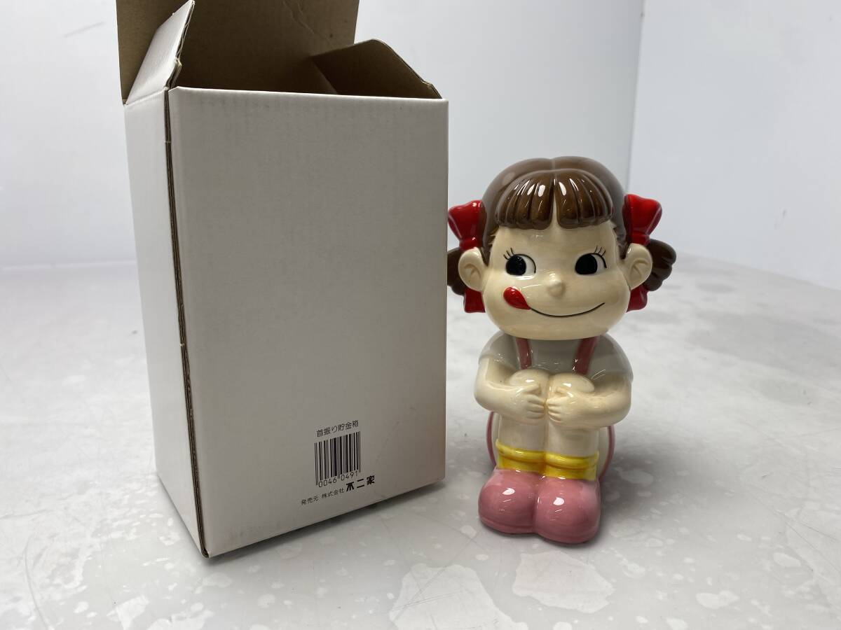 9/21★不二家 ぺこちゃん★首振り貯金箱 陶器 当時物【中古/現状品】拍卖