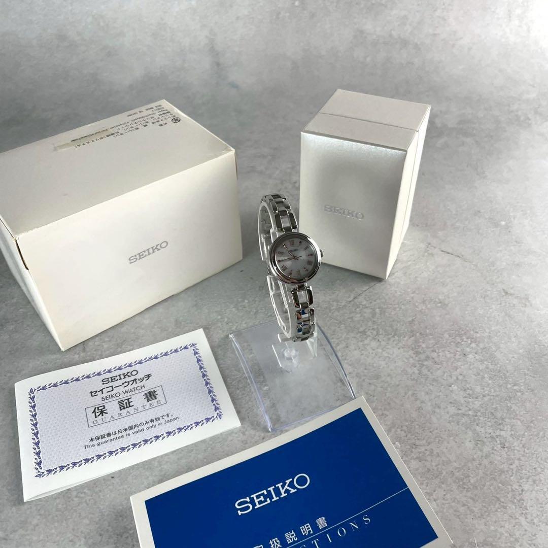 【稼働/箱付き/極美品】セイコー SEIKO ソーラー 電波 腕時計 1A21-0AP0シルバー レディース 保証書付き拍卖