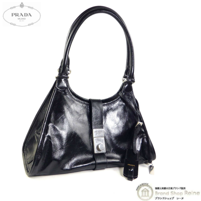 プラダ (PRADA) ミディアム レザー トート トラペゾイド ミラーチャーム付 肩掛け ショルダー ハンド バッグ 1BG563 ブラック(新品)拍卖