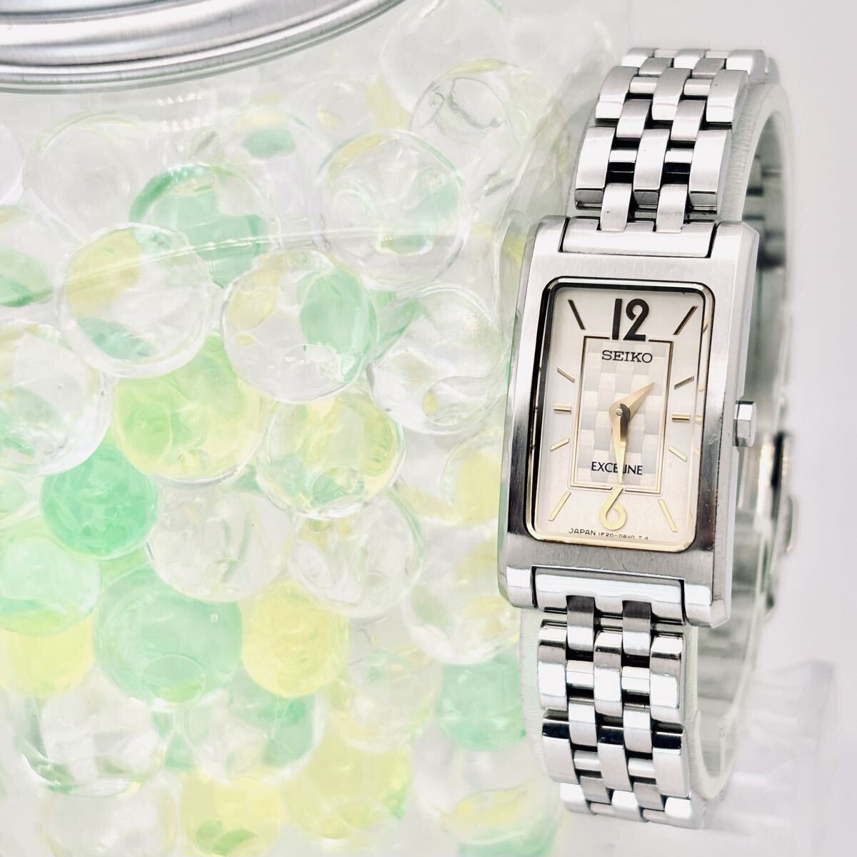 【美品/新品電池】SEIKO セイコー EXCELINE エクセリーヌ レディース腕時計 レクタンギュラー ドレス シルバー1F20-0AN0 351448 純正ベルト拍卖